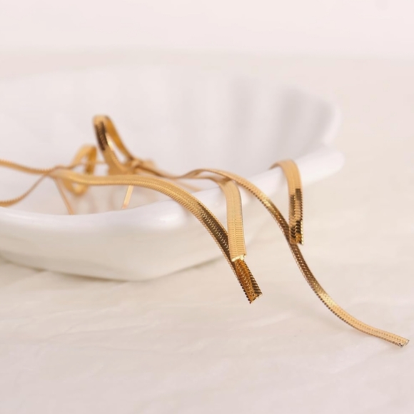 Elegant Gold Bow Earrings - Picture 6 of 6